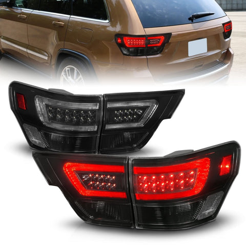 ANZO 11-13 Jeep Grand Cherokee LED Taillights w/ Lightbar Black Housing/Smoke Lens 4pcs - 311440