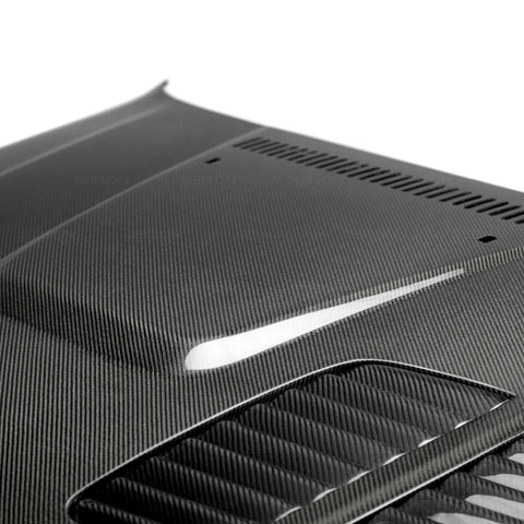 Seibon 08-11 BMW 1 Series (E81/E82) 2DR/HB GTR-Style Carbon Fiber Hood - HD0809BMWE822D-GTR