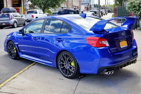 Rally Armor 15-21 Subaru WRX/STI (Sedan ONLY) Black UR Mud Flap w/ Green Logo - MF32-UR-BLK/CGN