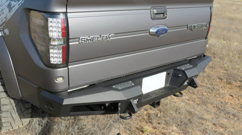 Addictive Desert Designs 10-14 Ford F-150 Raptor HoneyBadger Rear Bumper w/ Tow Hooks - R017301280103