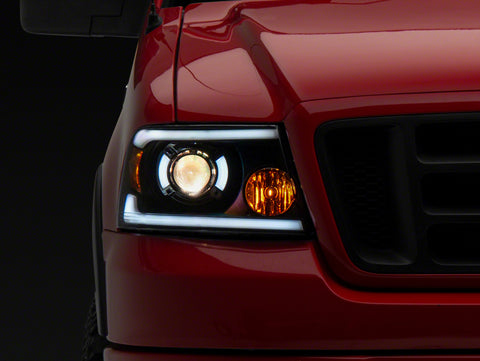 Raxiom 04-08 Ford F-150 Axial Series Projector Headlights w/ SEQL LED Bar- Blk Housing (Clear Lens) - T566364