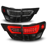 ANZO 11-13 Jeep Grand Cherokee LED Taillights w/ Lightbar Black Housing/Smoke Lens 4pcs - 311440