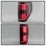 xTune 09-14 Ford F-150 Light Bar LED Tail Lights - Black Smoke (ALT-JH-FF15009-LBLED-BSM) - 9042195