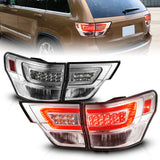 ANZO 11-13 Jeep Grand Cherokee LED Taillights w/ Lightbar Chrome Housing/Clear Lens 4pcs - 311441